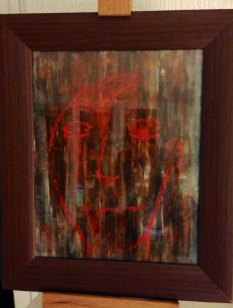 il y a un visage dans cette peinture